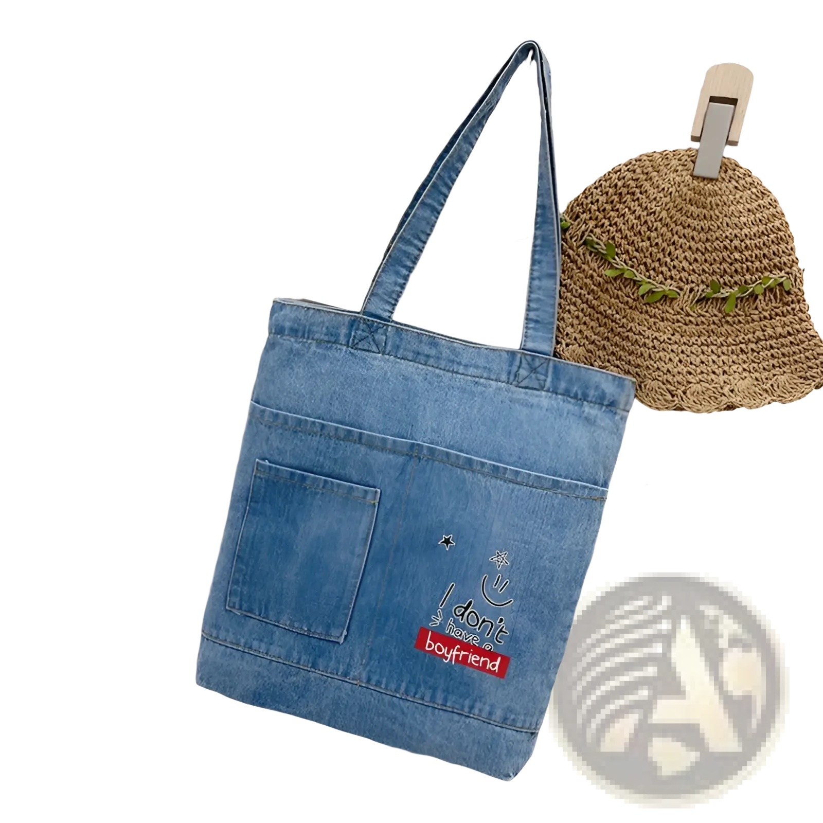 Blue denim tote bag with embroidered text, front pocket, and soft handle for everyday use