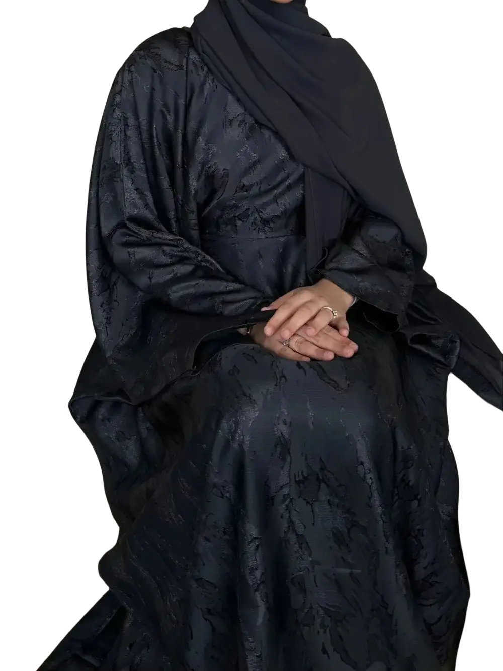 Black satin embroidered floral abaya kaftan maxi dress with subtle embossed floral pattern shown from the back side