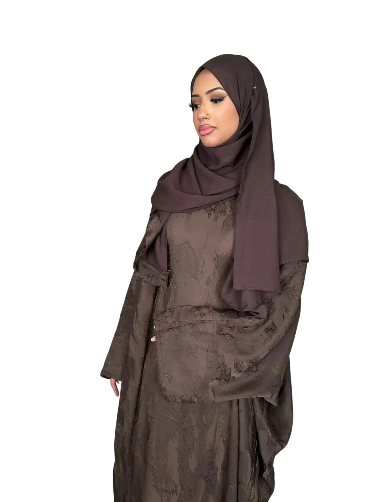 A woman wears a brown embroidered floral abaya kaftan maxi dress with matching hijab made from flowing fabric