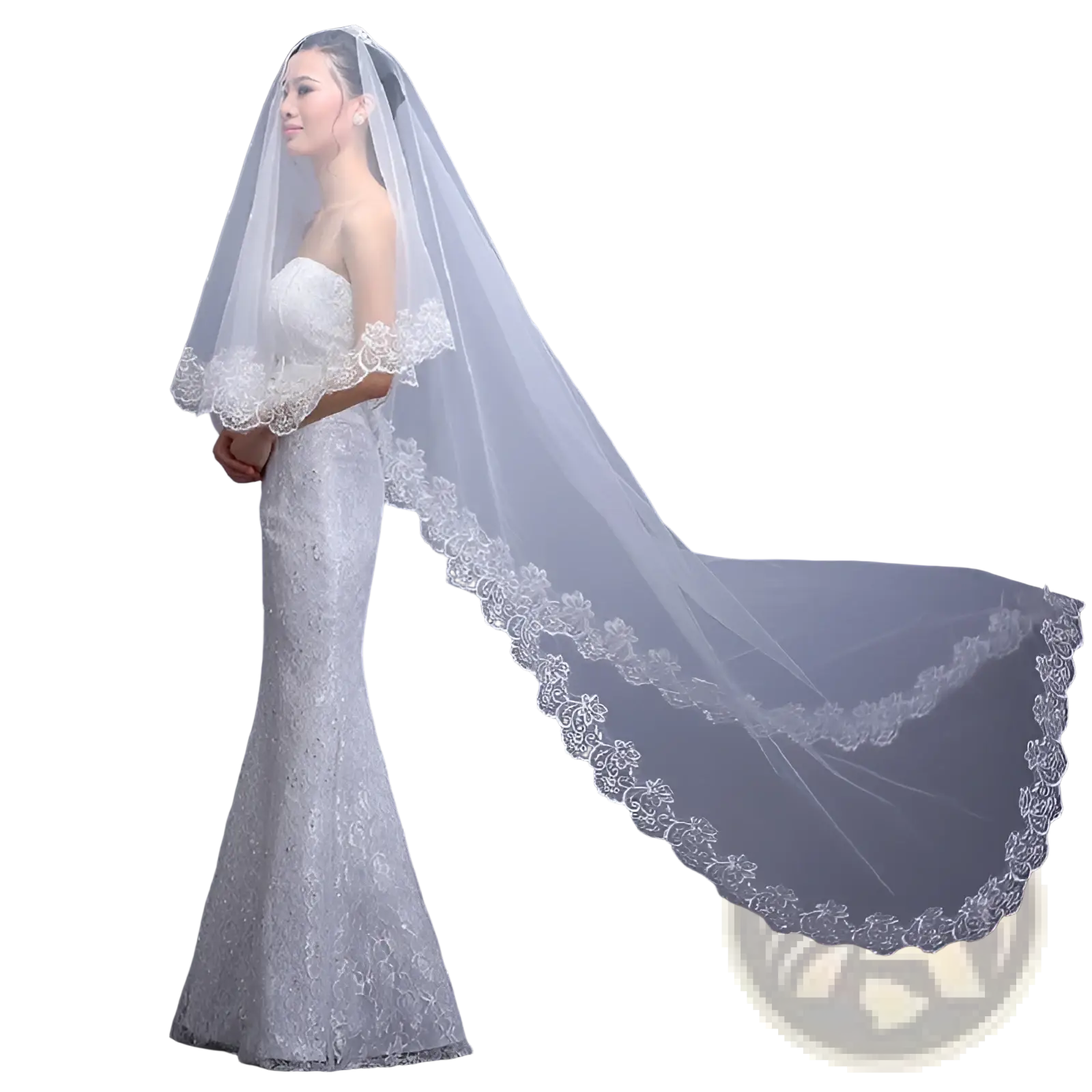 A flowing white lace cathedral wedding veil with delicate embroidered floral edges for bridal use
