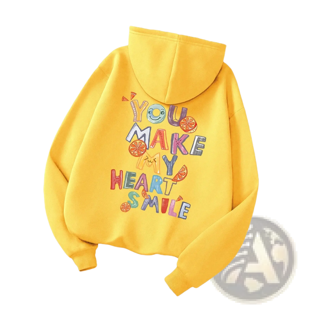 Bright yellow casual hoodie featuring colorful embroidered text and orange slice motifs on soft fabric