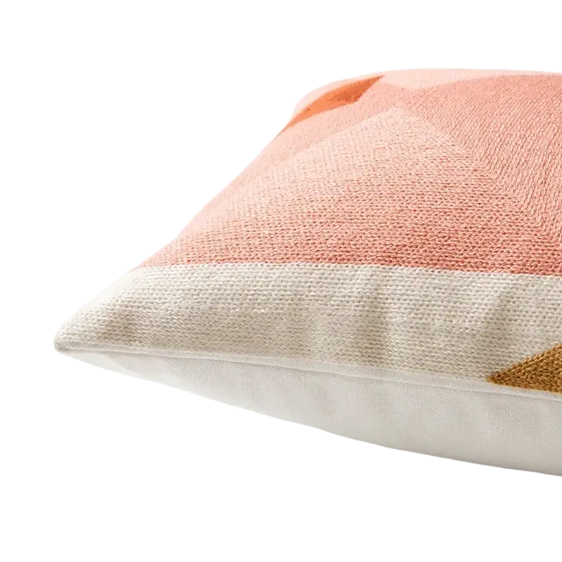 A soft peach and cream embroidered geometric cushion cover in textured linen fabric available in 45x45cm and 30x50cm