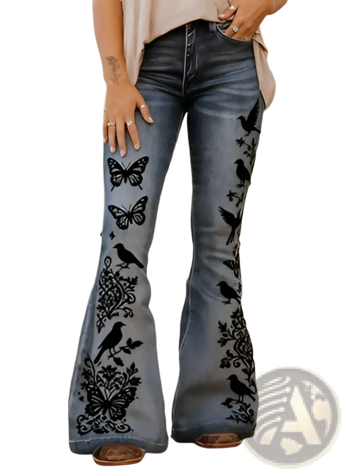 Embroidered high-waisted blue denim flare jeans featuring black butterfly and bird patterns visible from the back side