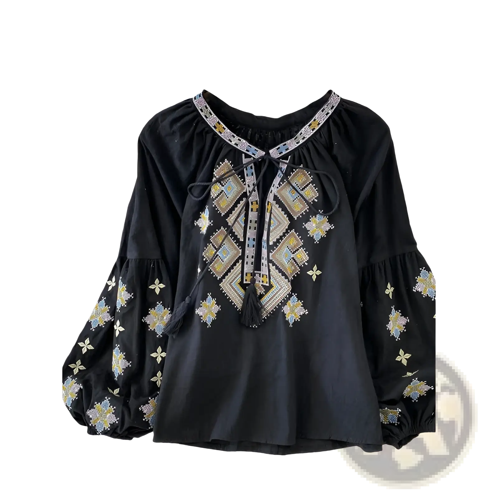 Black embroidered lantern sleeve blouse with intricate gold silver and white geometric patterns and tie-front tassels