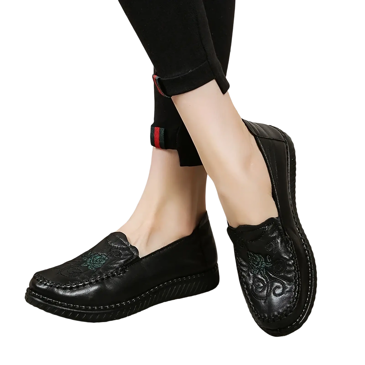Black leather slip on loafers with embroidered floral designs on the vamp for stylish casual wear
