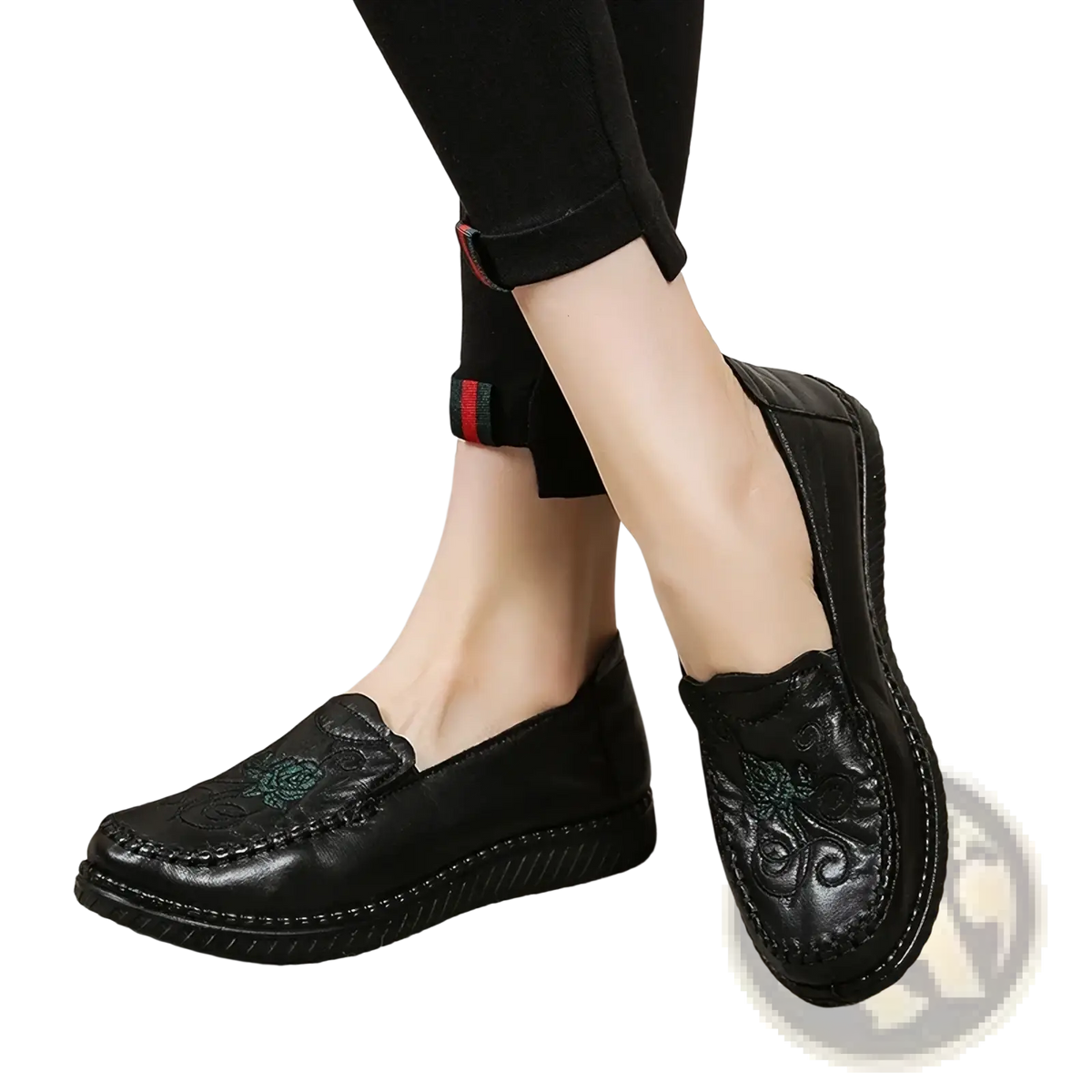 Black leather slip on loafers with embroidered floral designs on the vamp for stylish casual wear