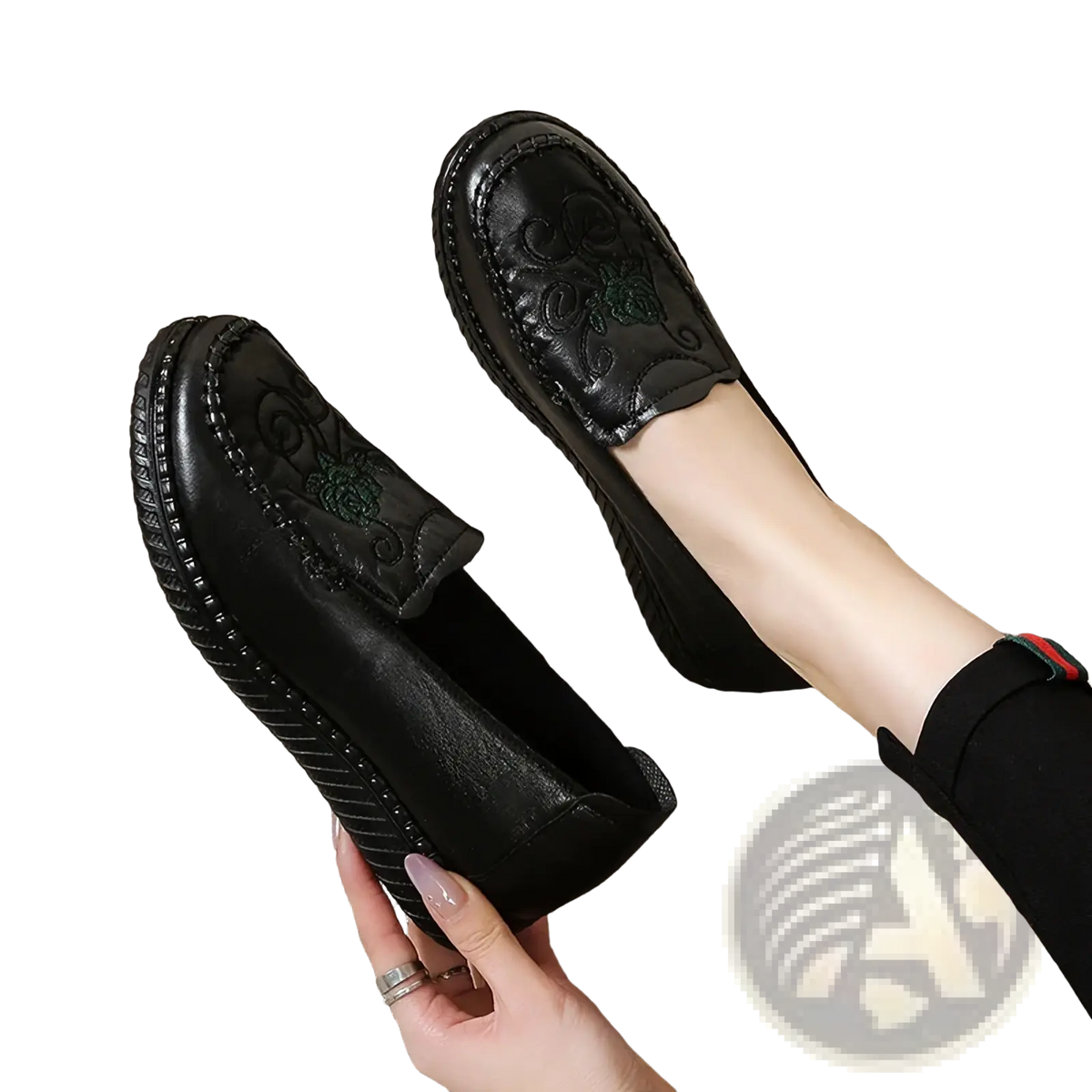 Black leather embroidered slip on loafers with green floral embroidery on the side for stylish wear