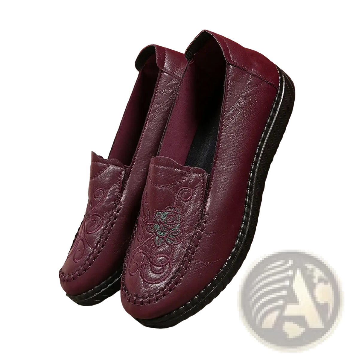Marron leather slip on loafers with embroidered floral design and black rubber soles for stylish wear
