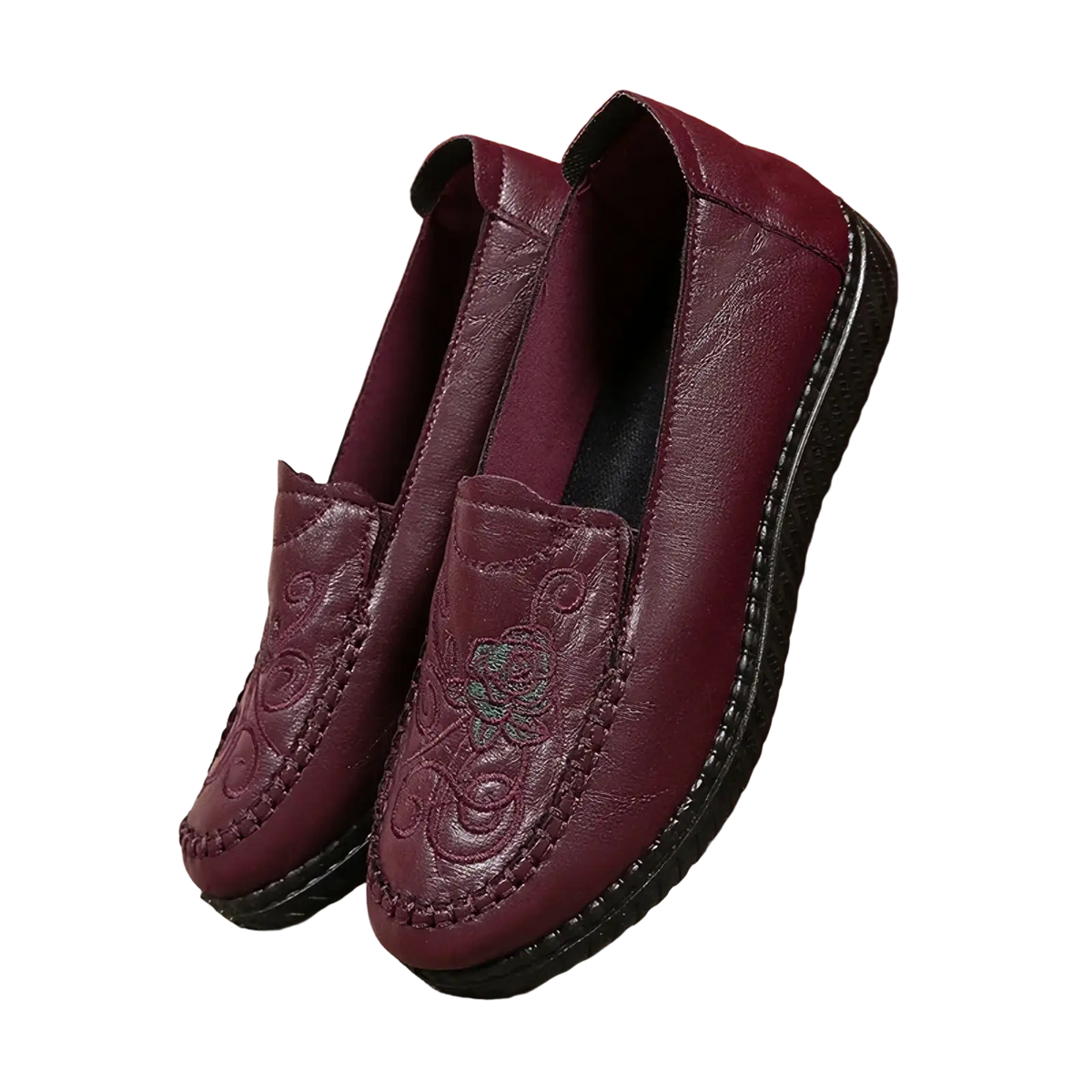 Marron leather slip on loafers with embroidered floral design and black rubber soles for stylish wear