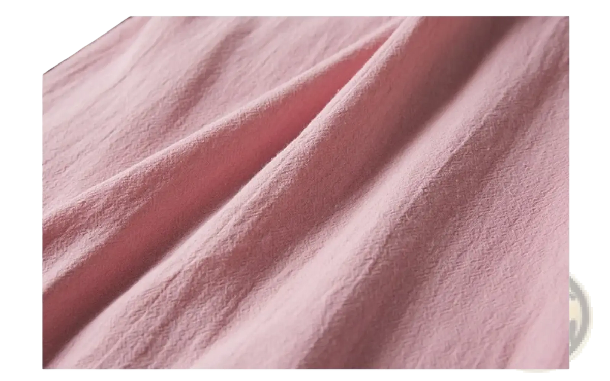 Soft pink embroidered linen dress with subtle textured weave chinese style summer outfit fabric close-up