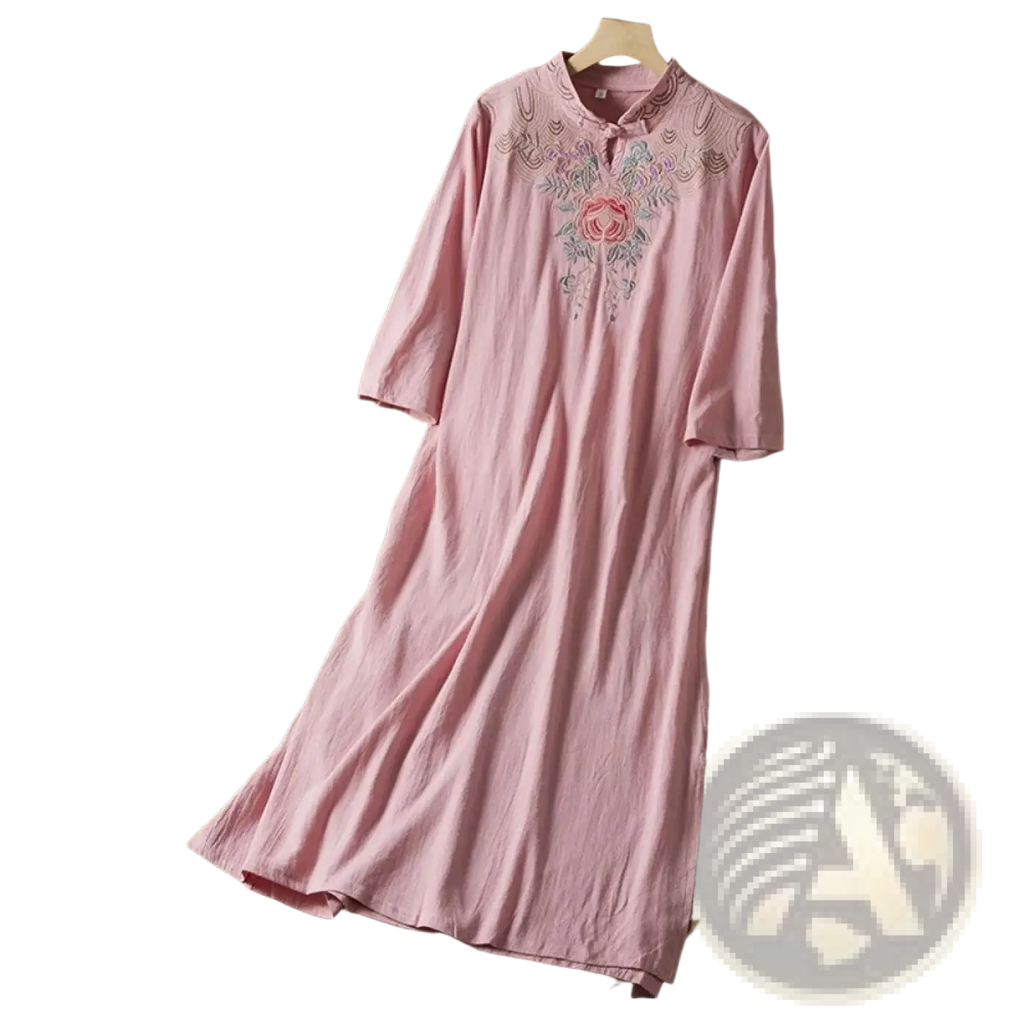 A soft pink embroidered linen dress with floral embroidery around the neckline for Chinese style summer outfit
