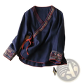 Navy blue linen embroidered wrap blouse with red and gold embroidery along neckline cuffs and hem