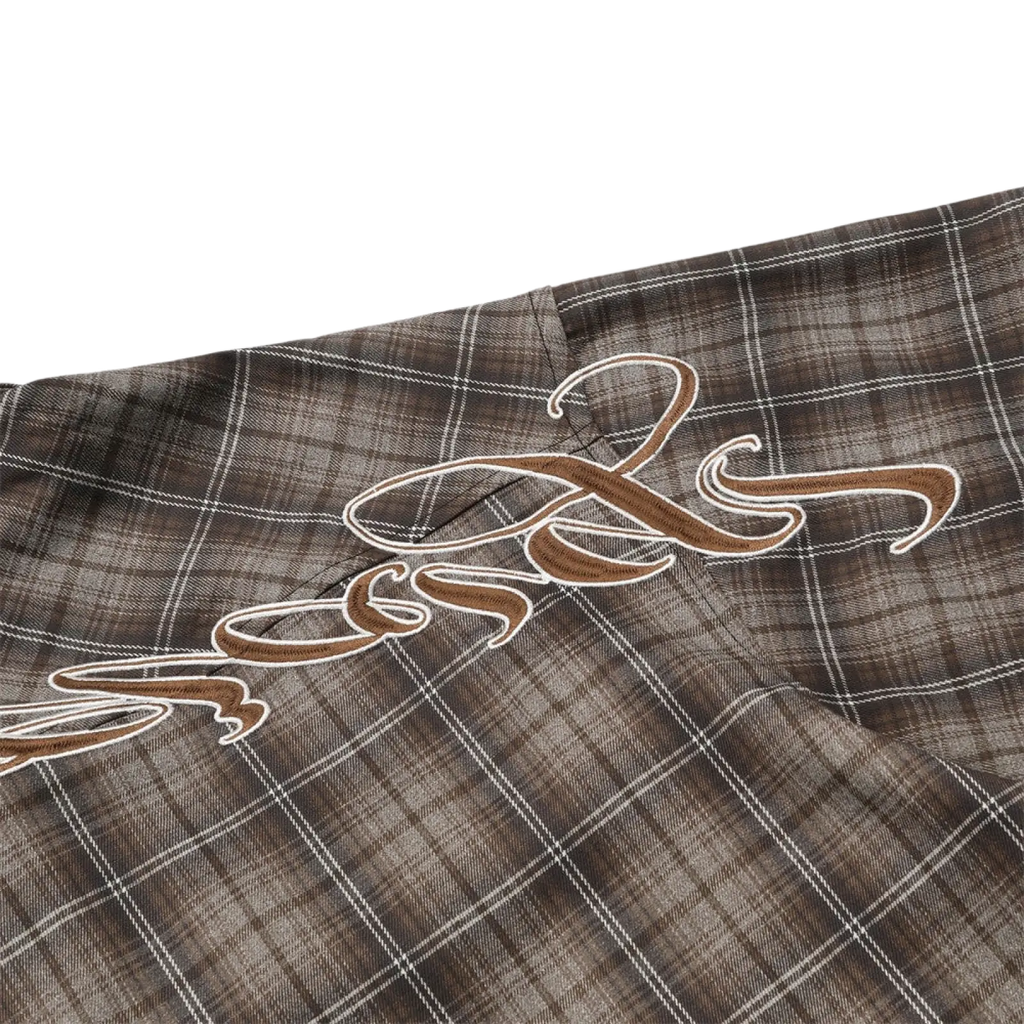 Embroidered plaid short sleeve shirt in brown and white fabric with a stitched brown cursive logo on the front