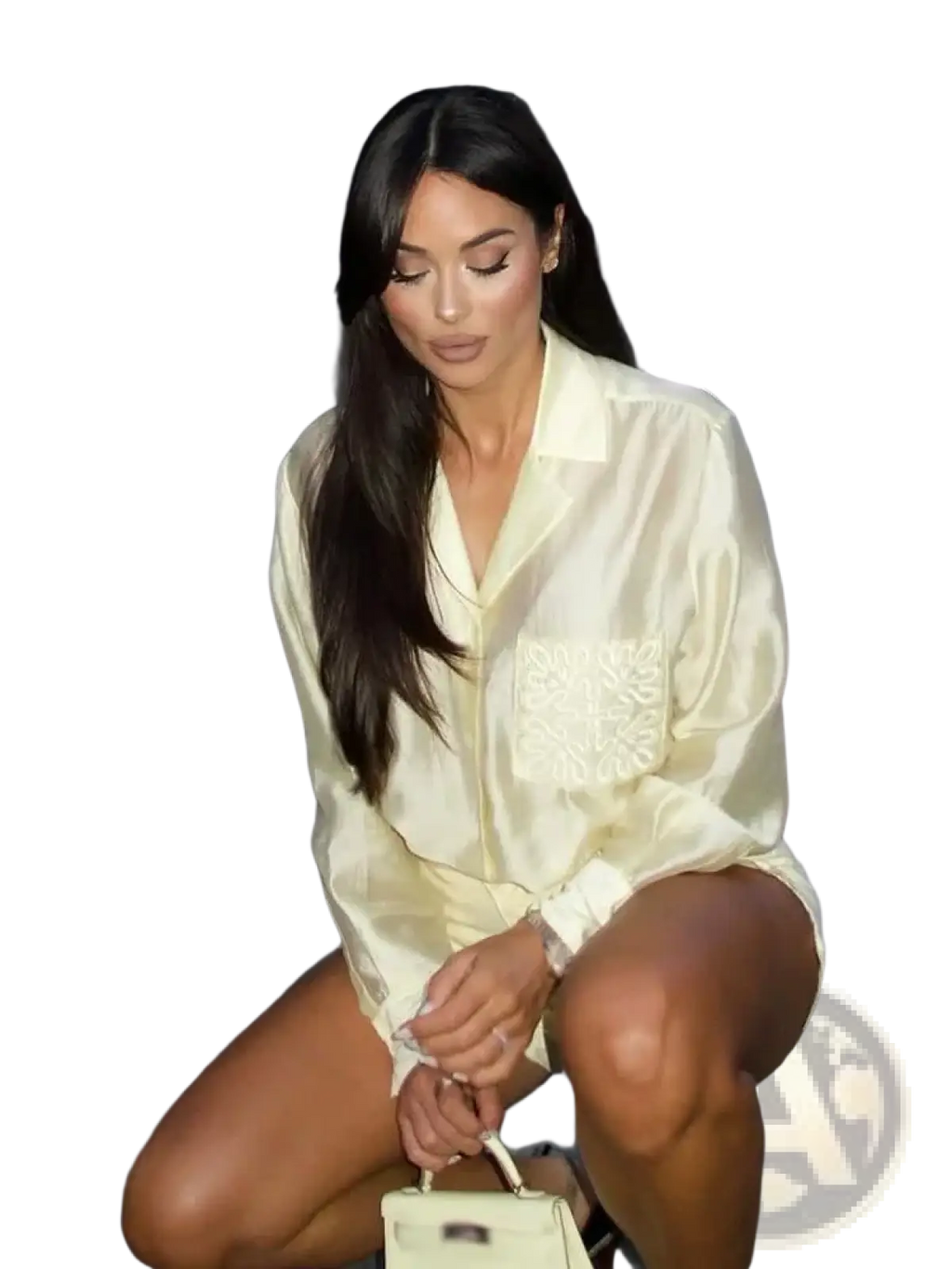 A cream-colored satin embroidered satin button-up blouse with a subtle embroidered pocket detail