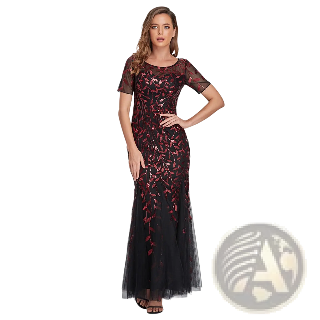 A black and burgundy embroidered sequin mermaid evening gown with sheer short sleeves and a tulle skirt