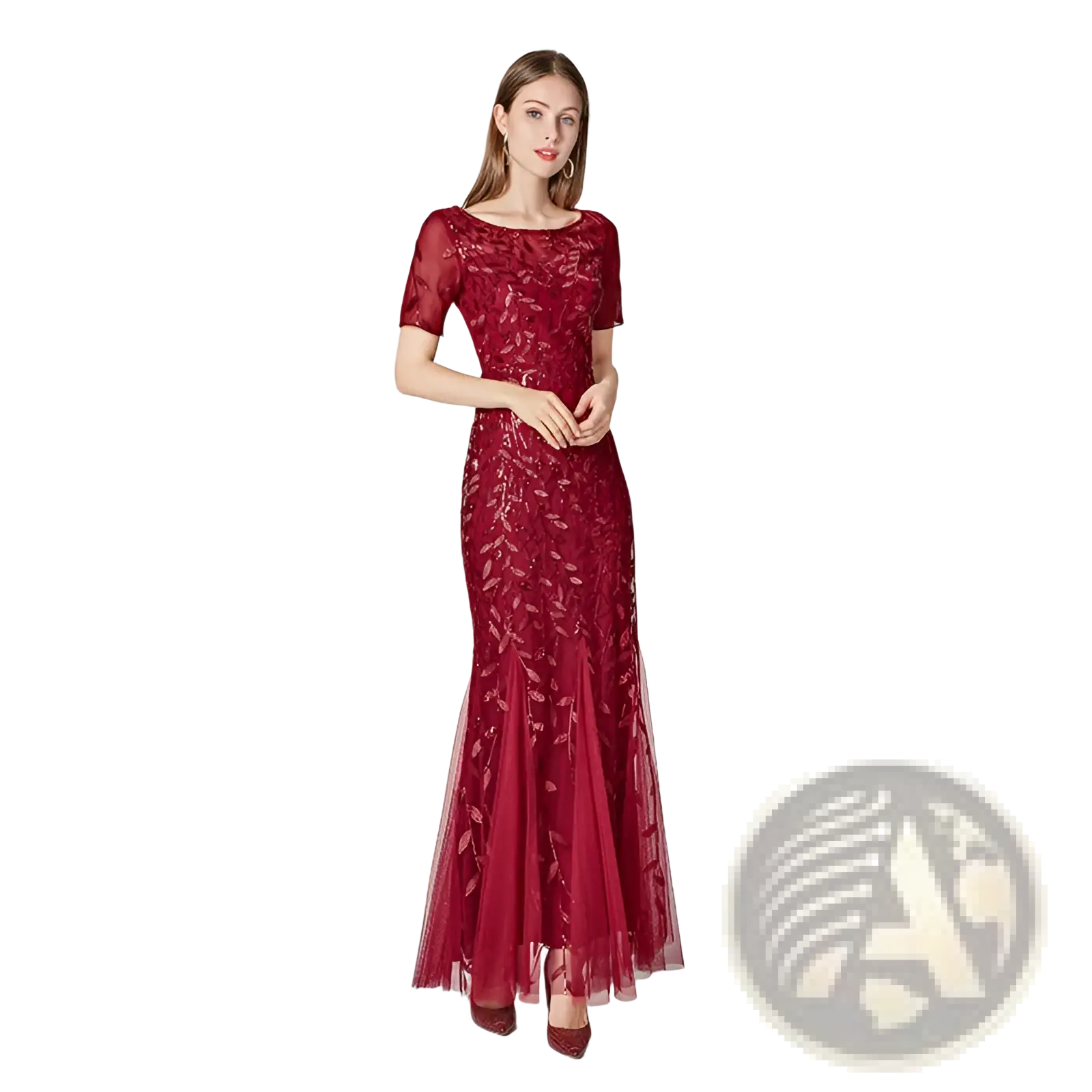 A deep red embroidered sequin mermaid evening gown with intricate lace detailing and sheer tulle skirt