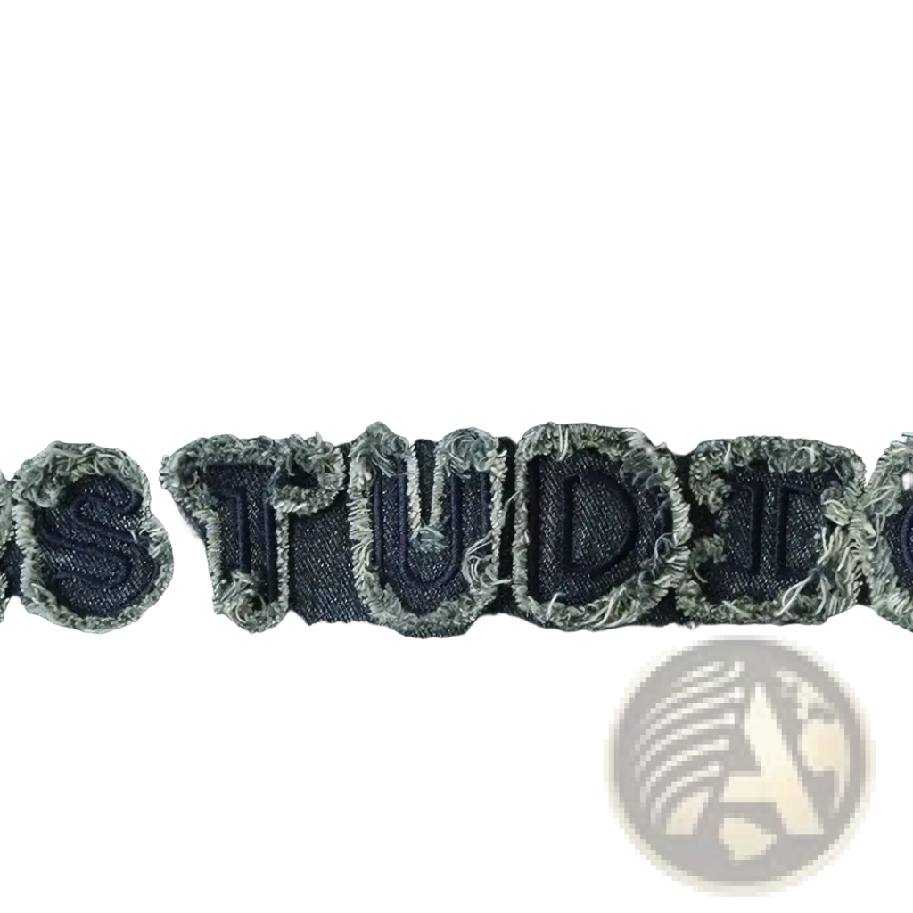 Dark blue denim embroidered star jacket with distressed frayed edge patch reading studio on the back side