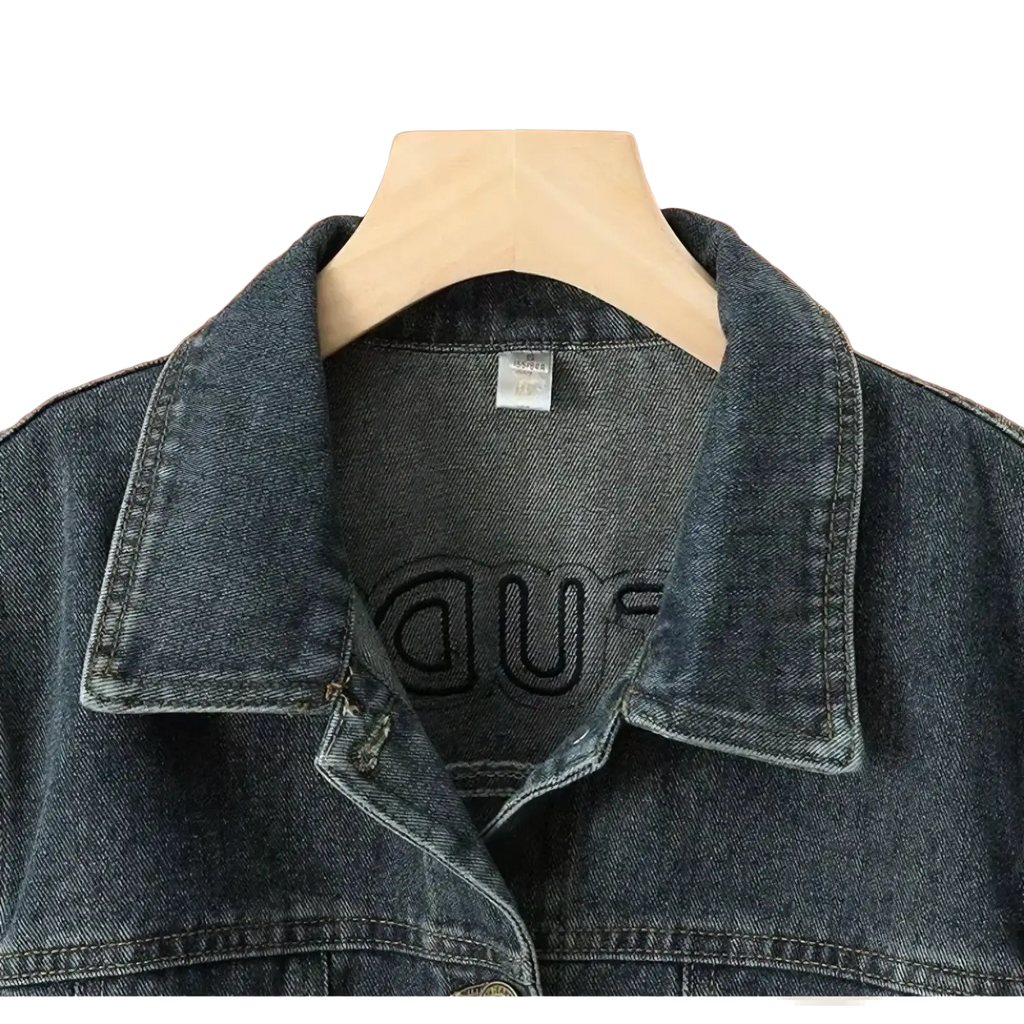 Dark blue embroidered star denim jacket with stitched collar and embroidered logo on the inside