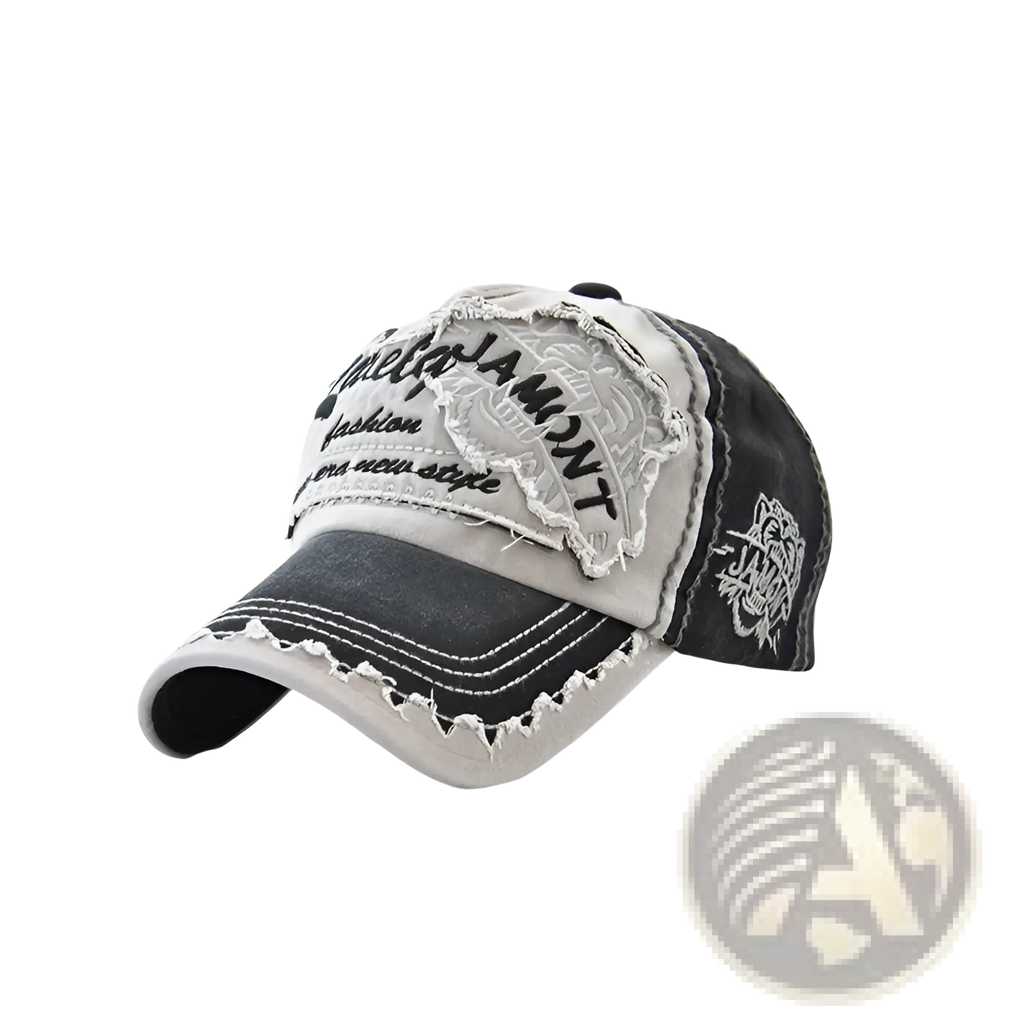 A distressed black and gray denim baseball cap with embroidered tiger patch and contrasting white stitching