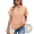 Peach-colored short-sleeved embroidered v-neck summer blouse with delicate diamond-patterned eyelet design