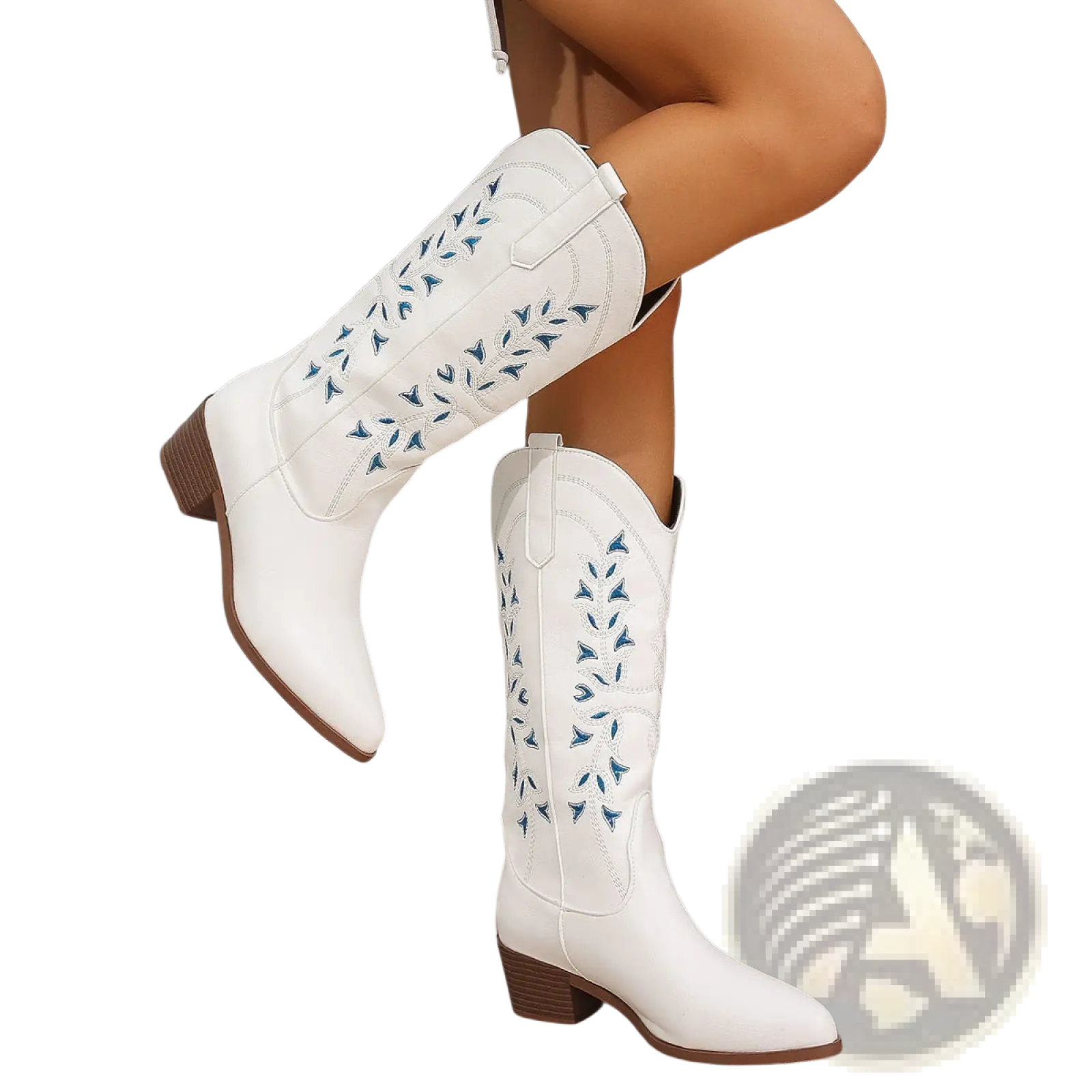 White leather embroidered western cowboy boots with blue stitched leaf patterns and brown chunky block heels