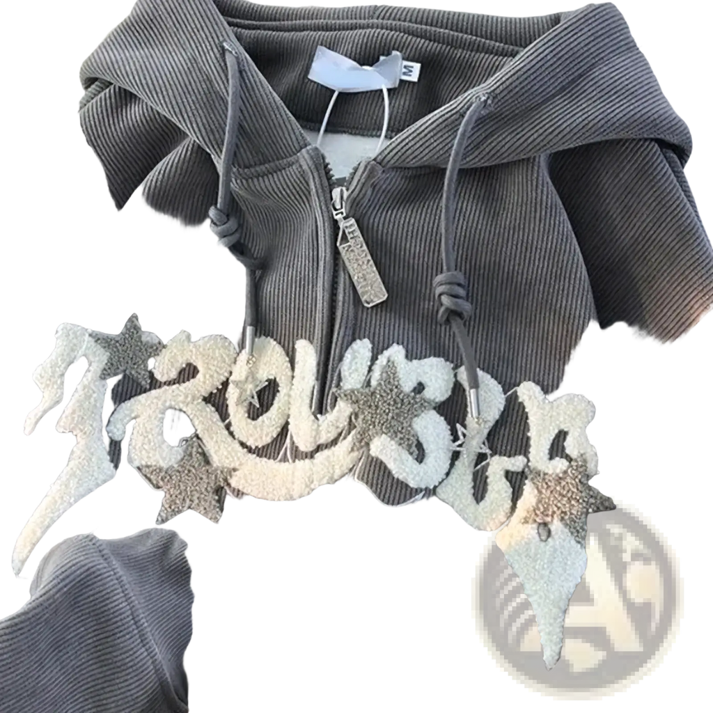 Gray corduroy zip-up hoodie with glittery white and silver star appliqué lettering reading trouble on the chest