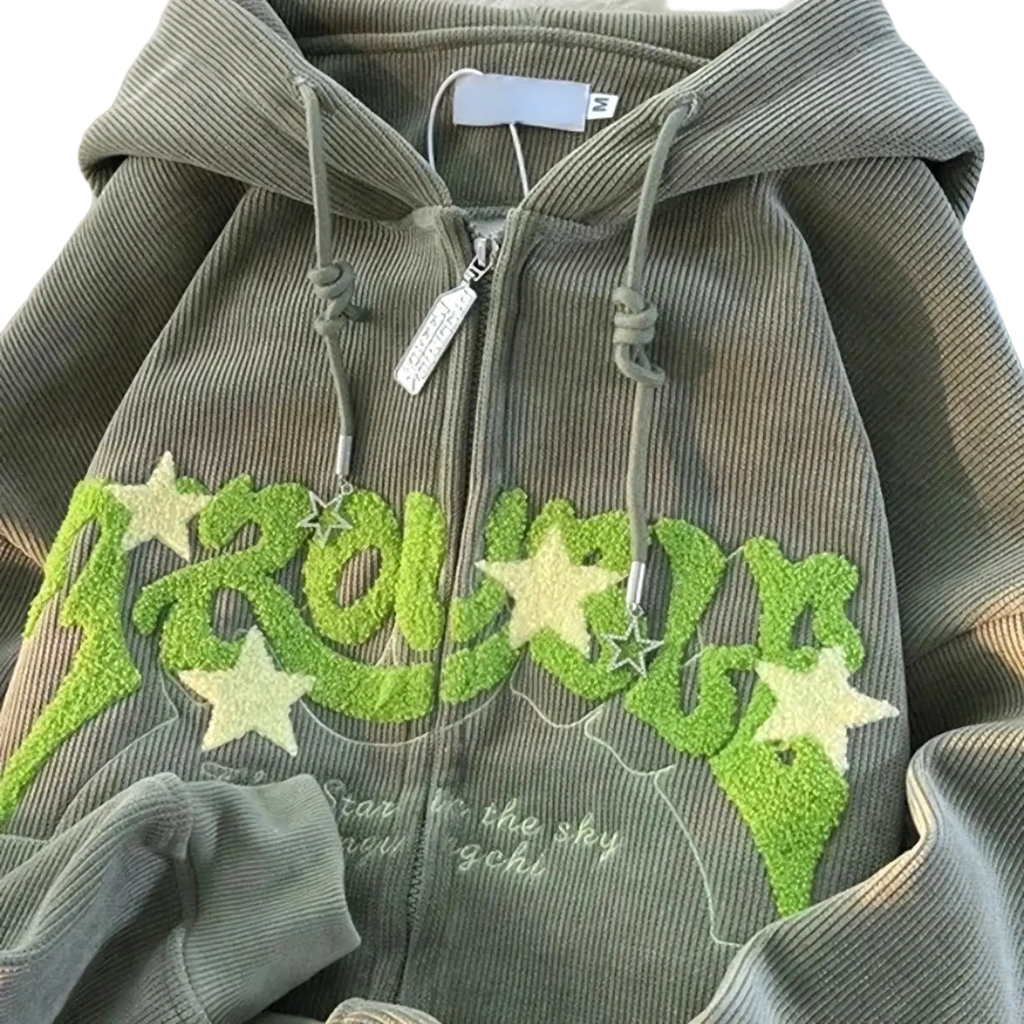 Olive green corduroy zip-up hoodie with lime green and white star appliqués embroidered in Y2k style