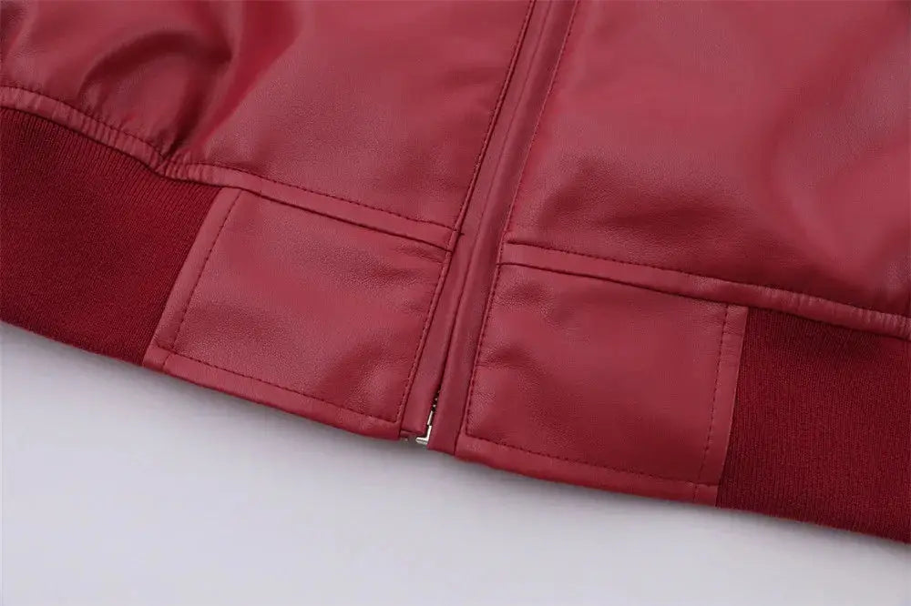 Men’s red faux leather bomber jacket with ribbed cuffs featuring embroidered stand collar detailing