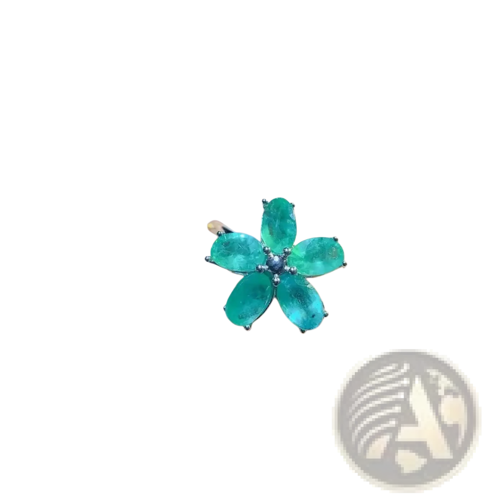 Emerald flower silver ring featuring a vibrant emerald green flower with five faceted petals and silver-toned metal