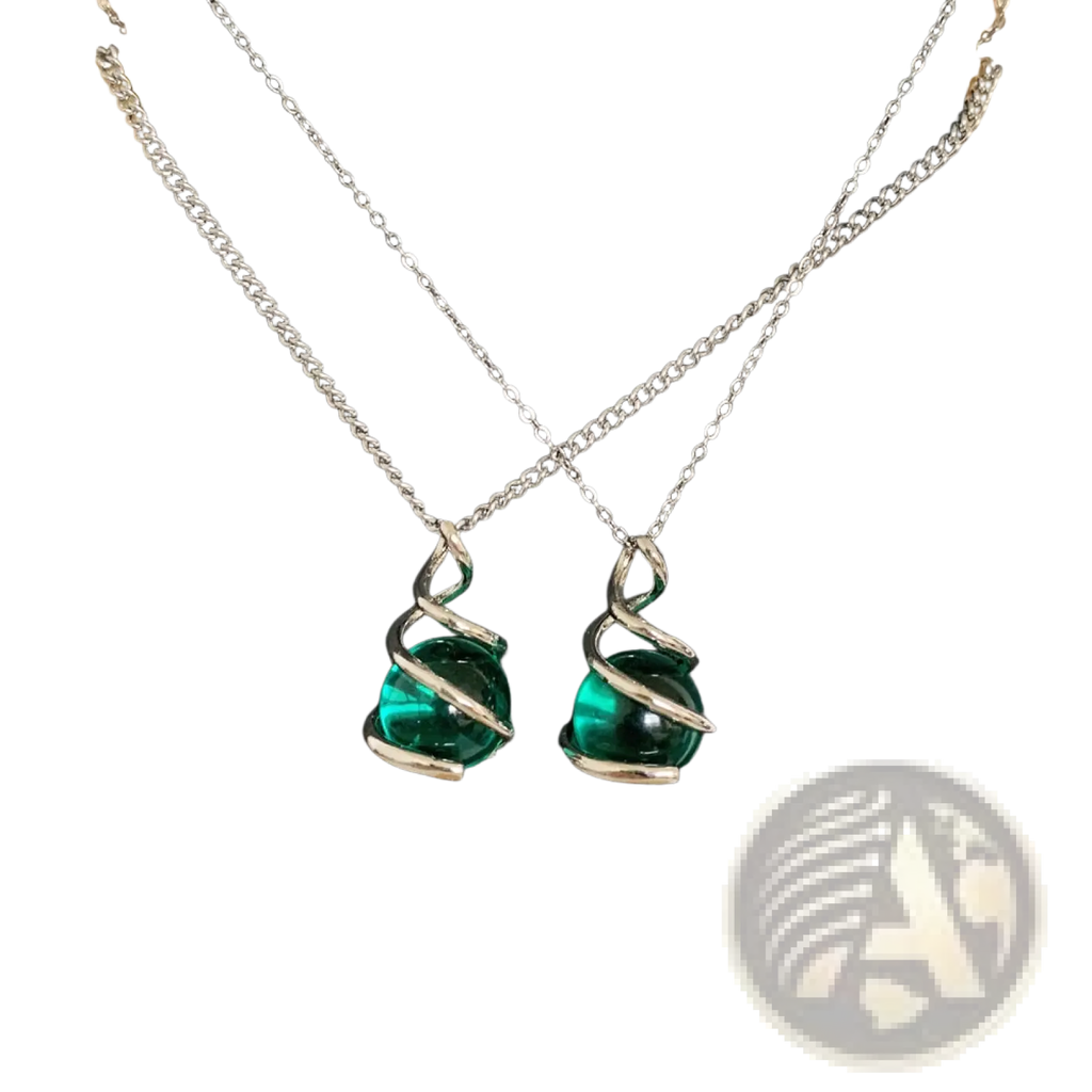 Emerald green glass sphere pendant necklace with silver-toned twisted wire spiral wrapping showcased on white background