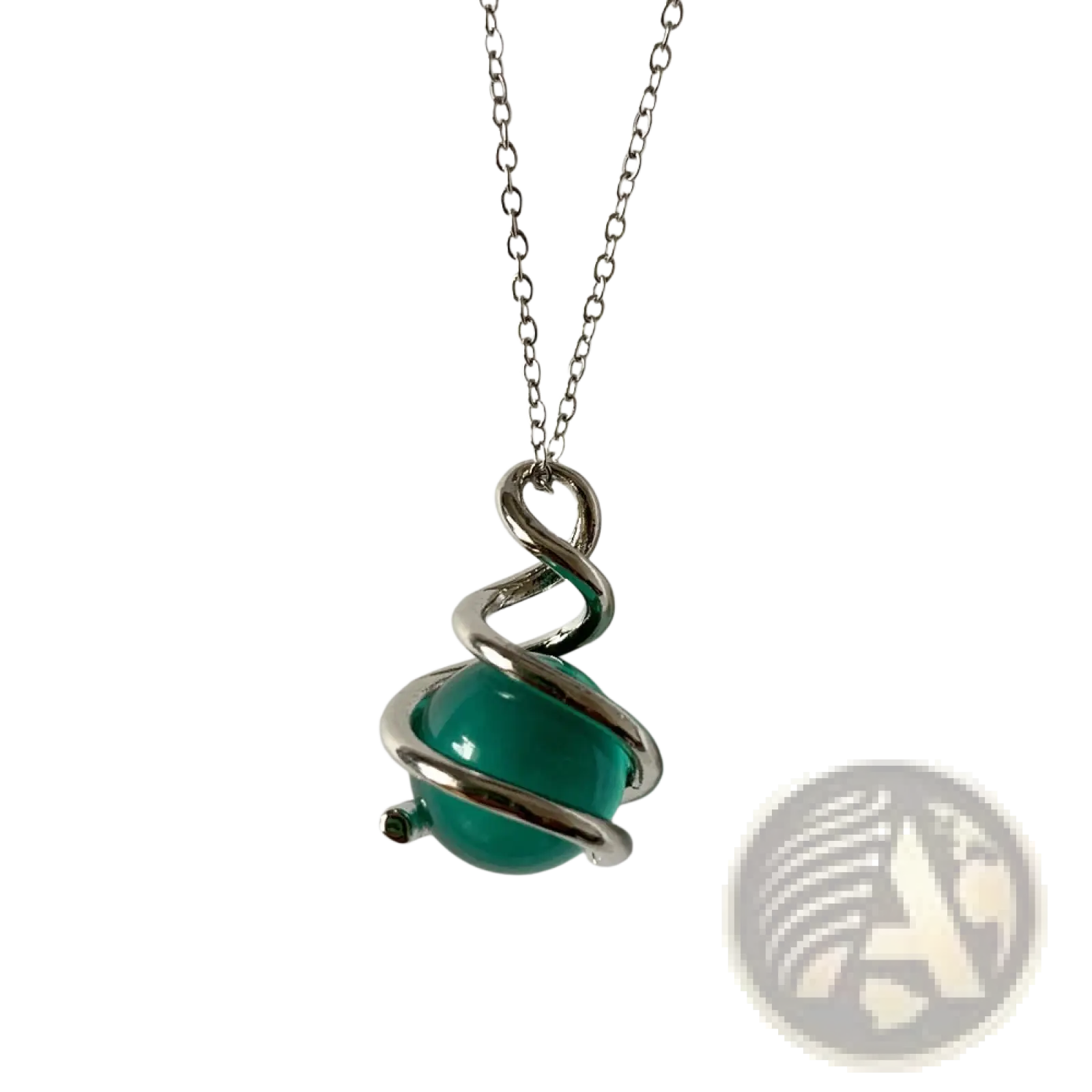 A sleek silver chain necklace with a vibrant green glass sphere pendant encircled by a twisted metal spiral