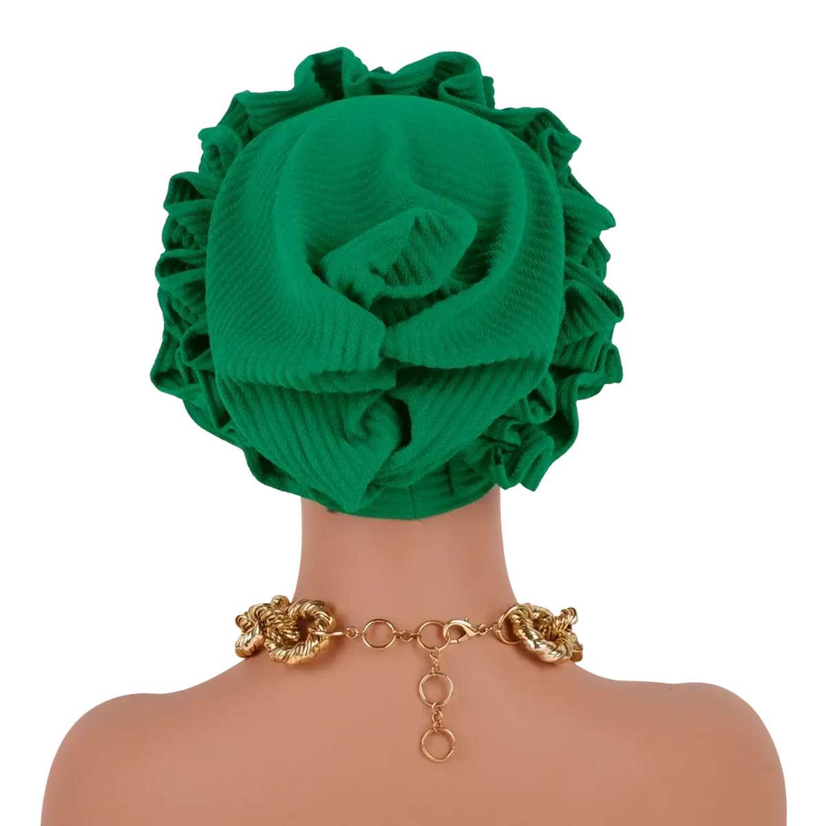 Emerald green ruffled turban cap with ribbed texture and voluminous flower-like folds in a soft fabric
