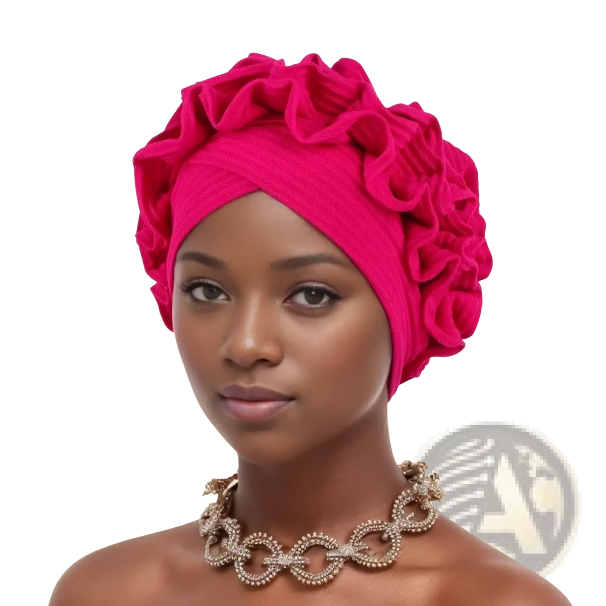 Emerald green ruffled turban cap with vibrant fuchsia ruffled headwrap and soft textured fabric finish