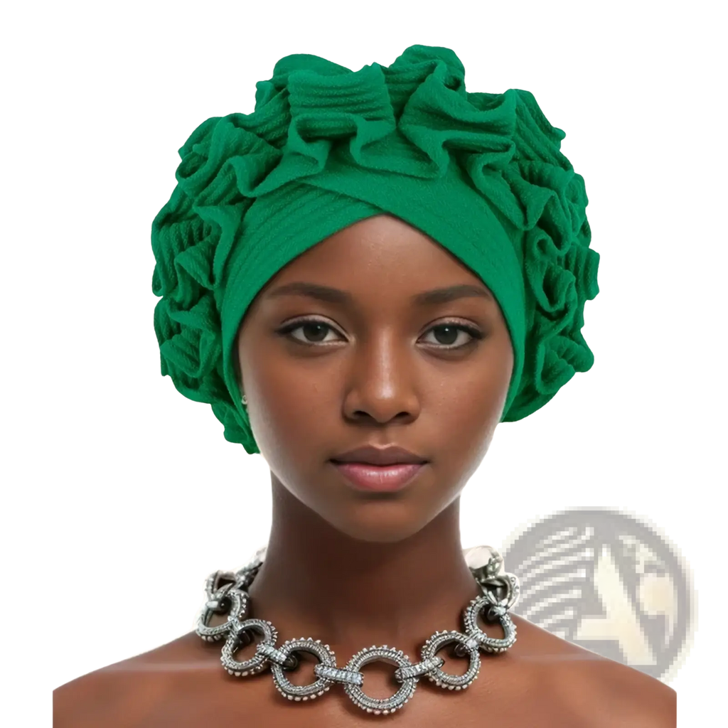 Emerald green ruffled turban cap made of soft textured fabric showcasing a vibrant and elegant headwrap design