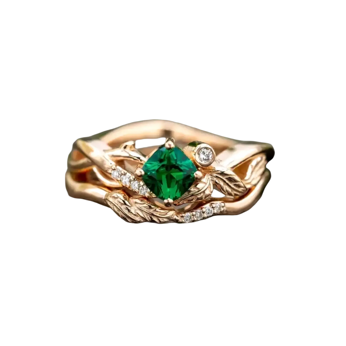 Emerald rose gold ring with a central emerald-cut green gemstone and diamond-accented leaf and vine design