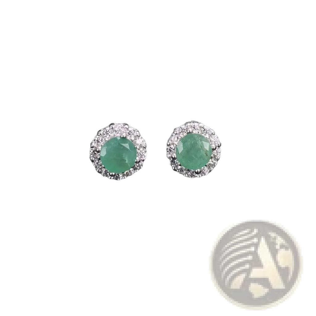 Elegant emerald stud earrings with a diamond halo set in silver-toned metal from emerald sterling silver jewelry set