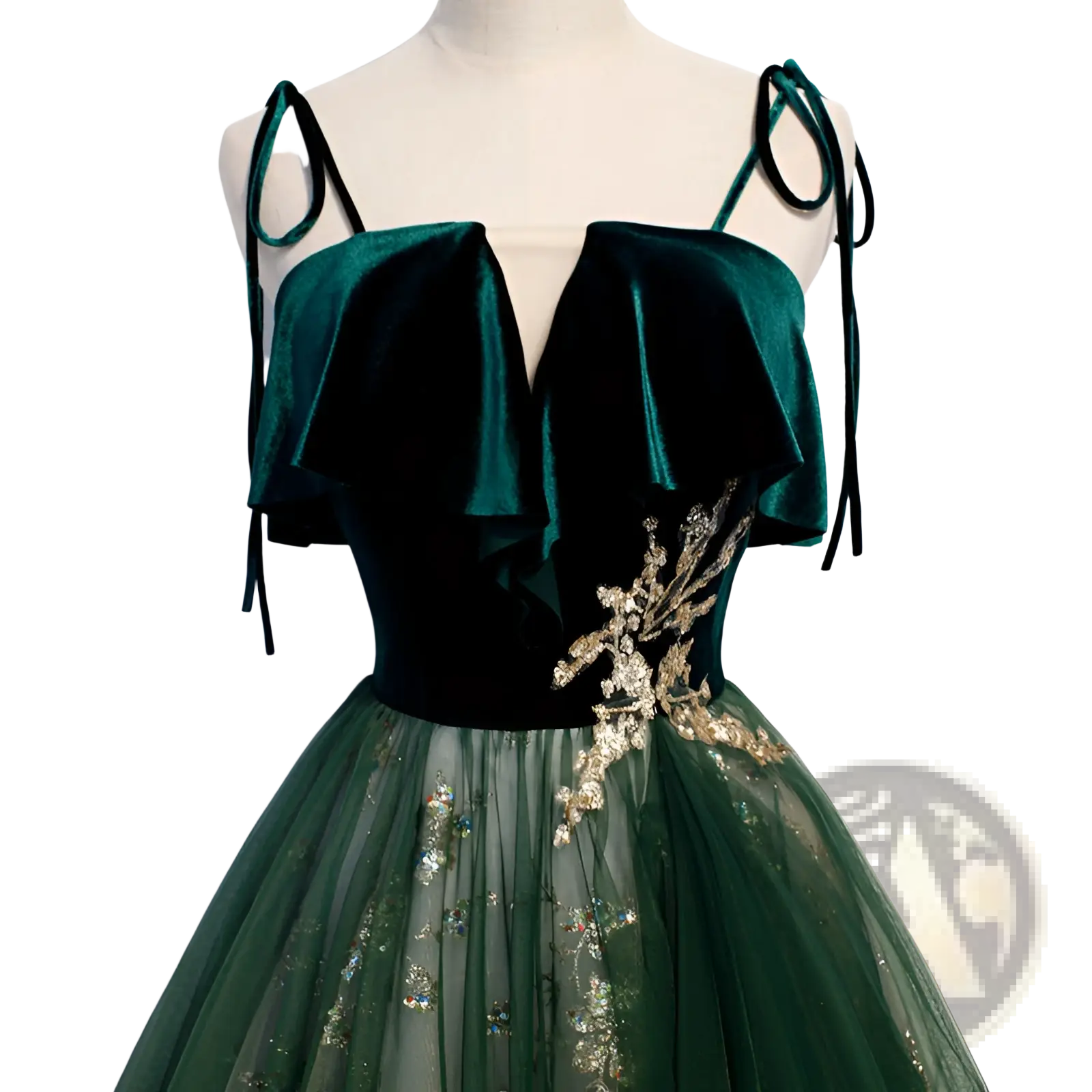Emerald green velvet off shoulder gown with gold beaded floral embroidery and sheer tulle skirt detailing