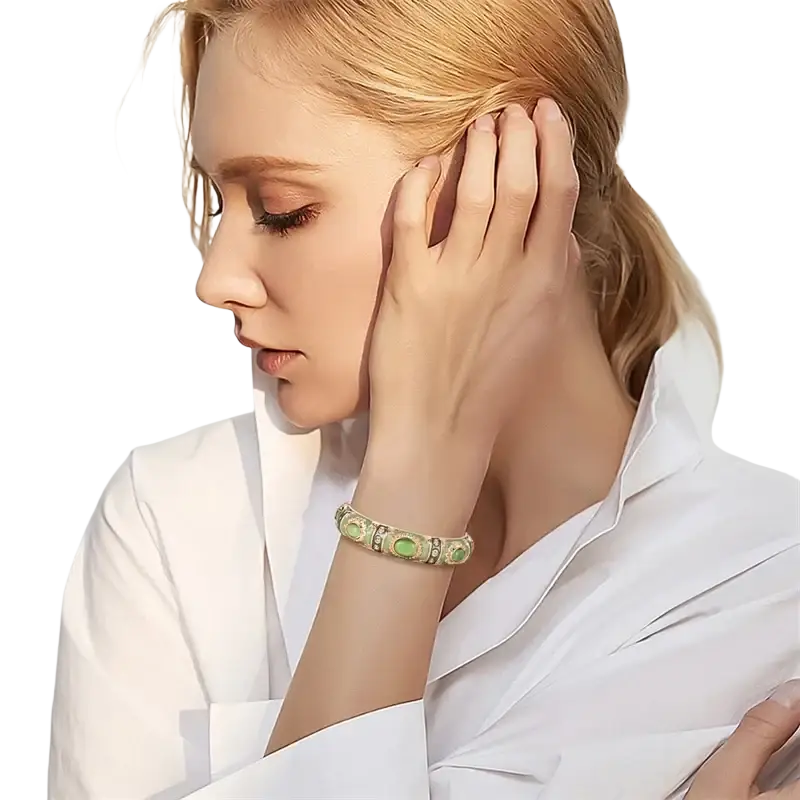 Gold-toned enamel bracelet hand bracelet with three green jade stones in a zinc alloy segmented design