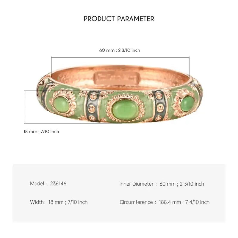 Green enamel bracelet with oval green stones and gold-toned zinc alloy accents in a hand bracelet design