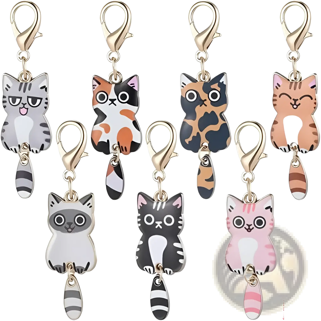 Set of seven colorful enamel cat keychains with gold-toned clasps and striped tails for cute charm accessories