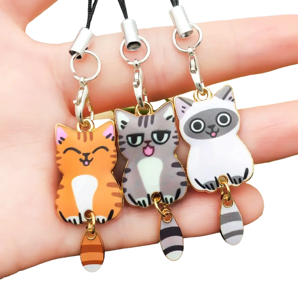 Enamel cat keychain and cute charms featuring three colorful cartoon cat phone charm pendants with striped tails