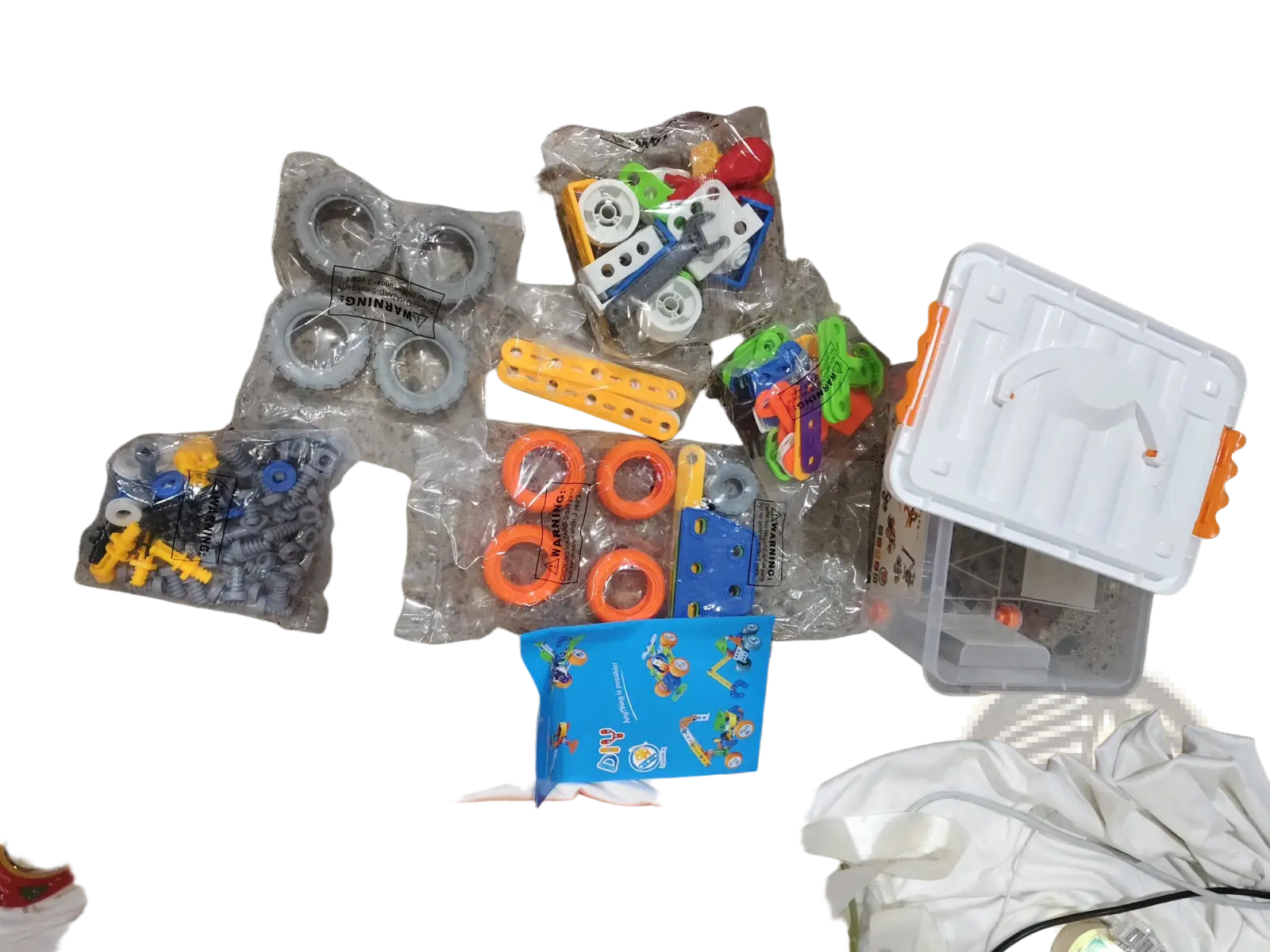 White and orange plastic storage box with hinged lid for engineering vehicle robot 10 in 1 building block set
