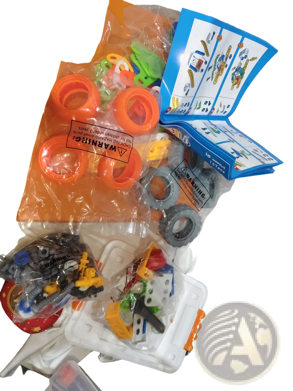 Orange and gray plastic toy construction set with instruction manual from engineering vehicle robot 10 in 1 building block set