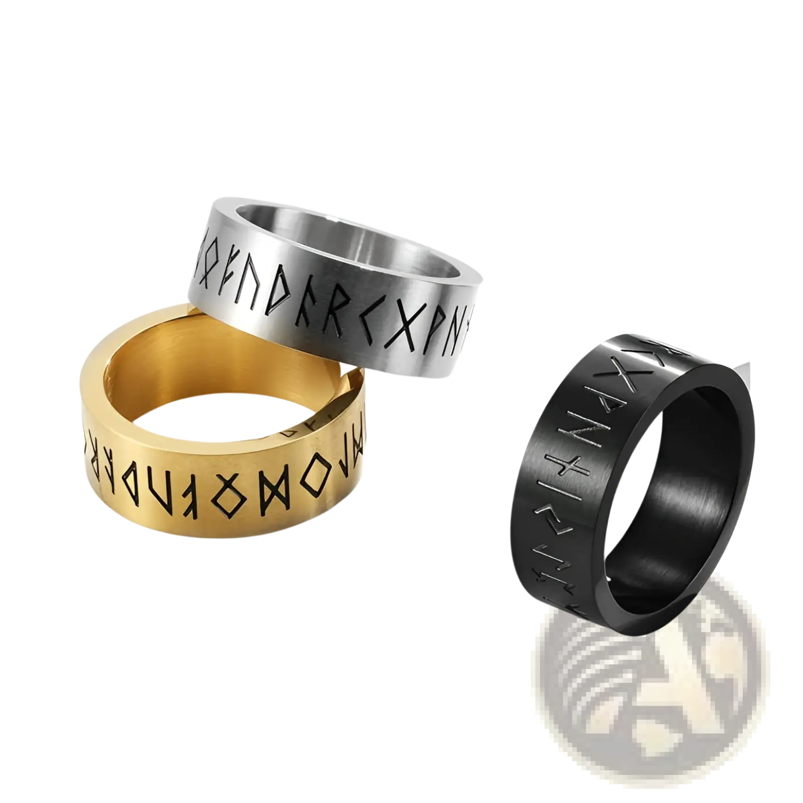 Three metallic engraved runic titanium steel band rings for men and women in gold and silver tones with blackened finishes