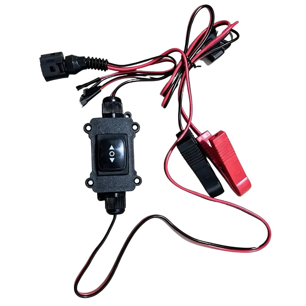 Black plastic epb caliper motor release tool with red and black wires toggle switch and insulated alligator clips for car repair