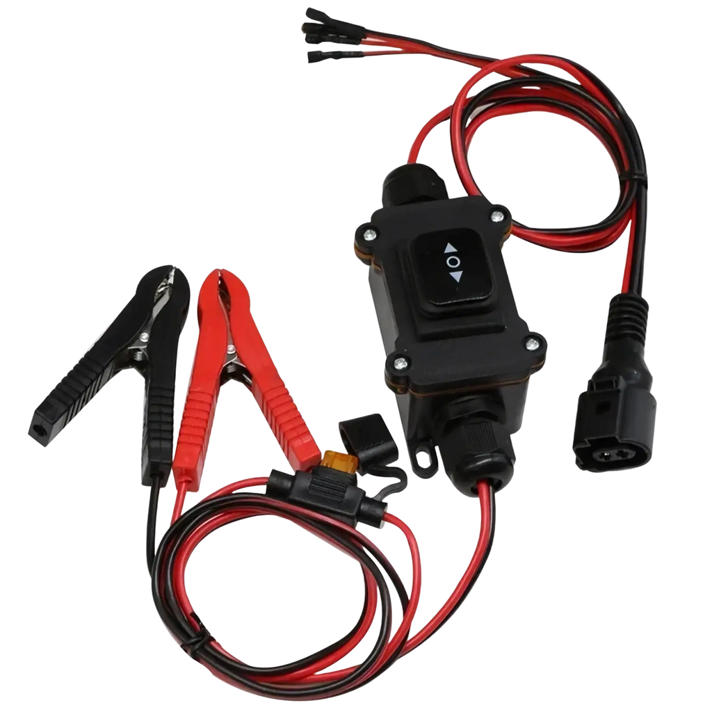 Black plastic epb caliper motor release tool with red and black clamps control button and coiled wiring for car repair