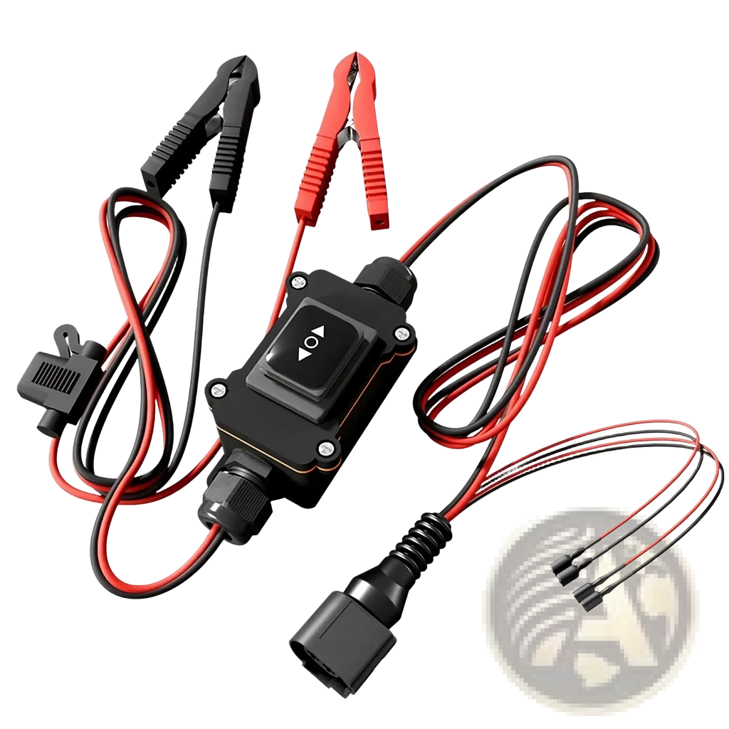 Black plastic car battery jump starter with red and black clamps for epb caliper motor release tool in car repair