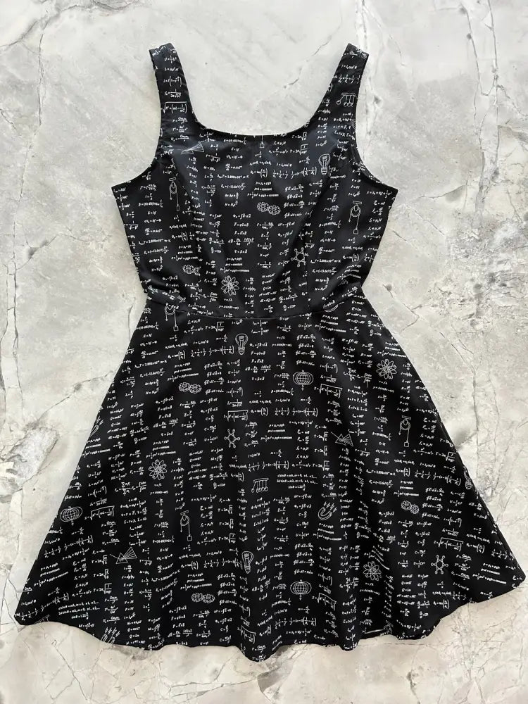 Black sleeveless skater dress with white mathematical equations print and pockets for casual wear