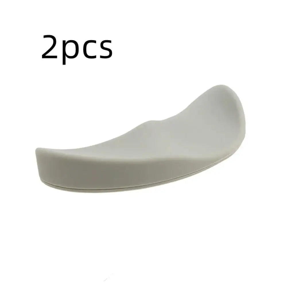 Gray silicone ergonomic gel mouse wrist rest with smooth curved design and gliding base for comfortable support