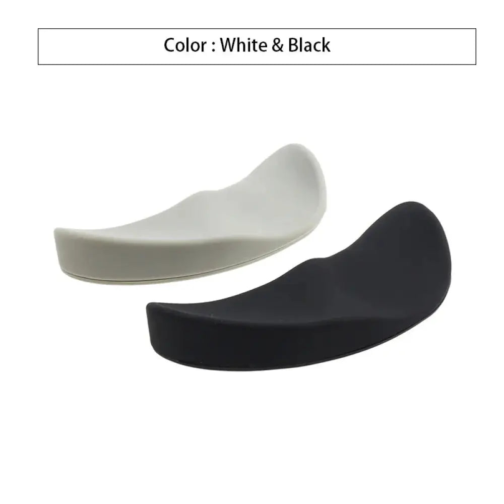 Ergonomic silicone gel mouse wrist rests in white and black with smooth curved design for comfortable support